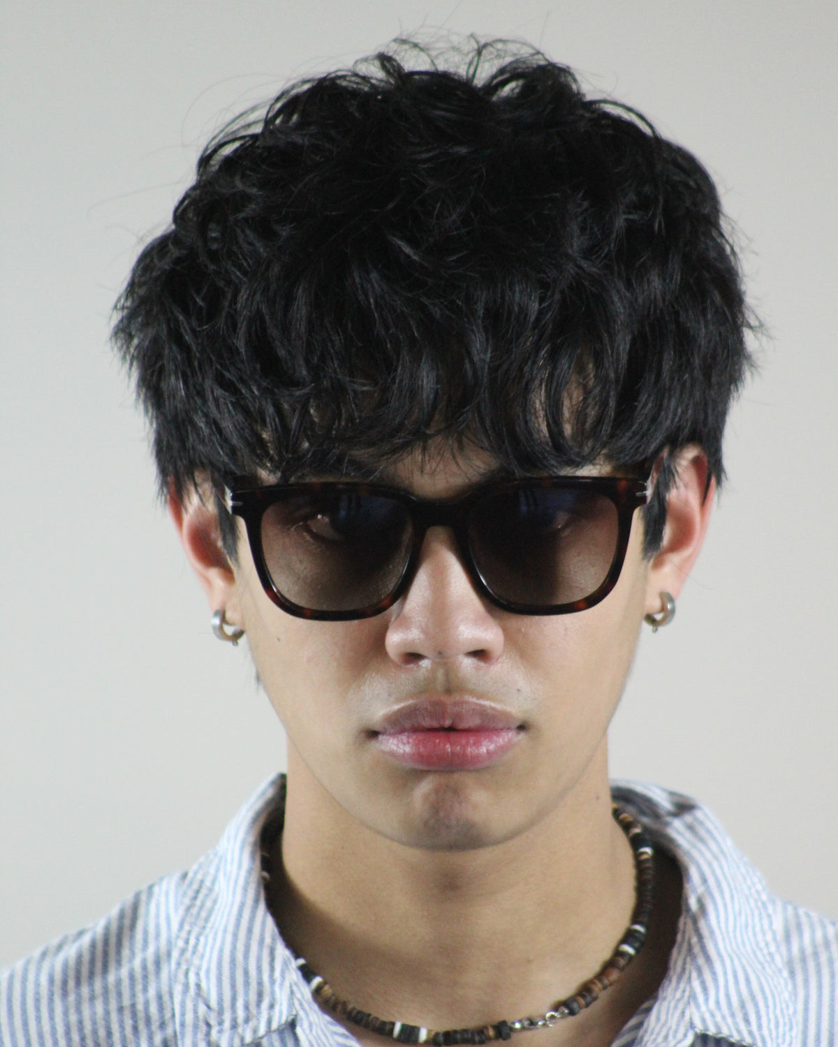 The Corsair Tortoise Shell sunglasses worn on model